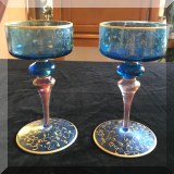 G30. Pair of hand painted blue goblets with gold embellishments. 7”h - $50 